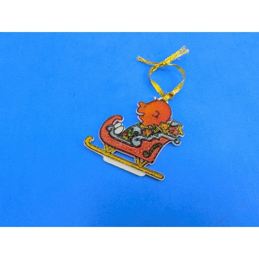 Vintage 70s Charlie Brown Painted Sleigh Ride Ornament Plastic Sparkle